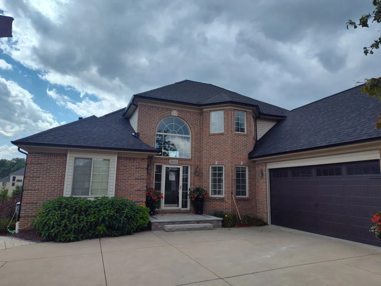 Brick home with completed exterior work by DG Builders LLC in Macomb County Michigan