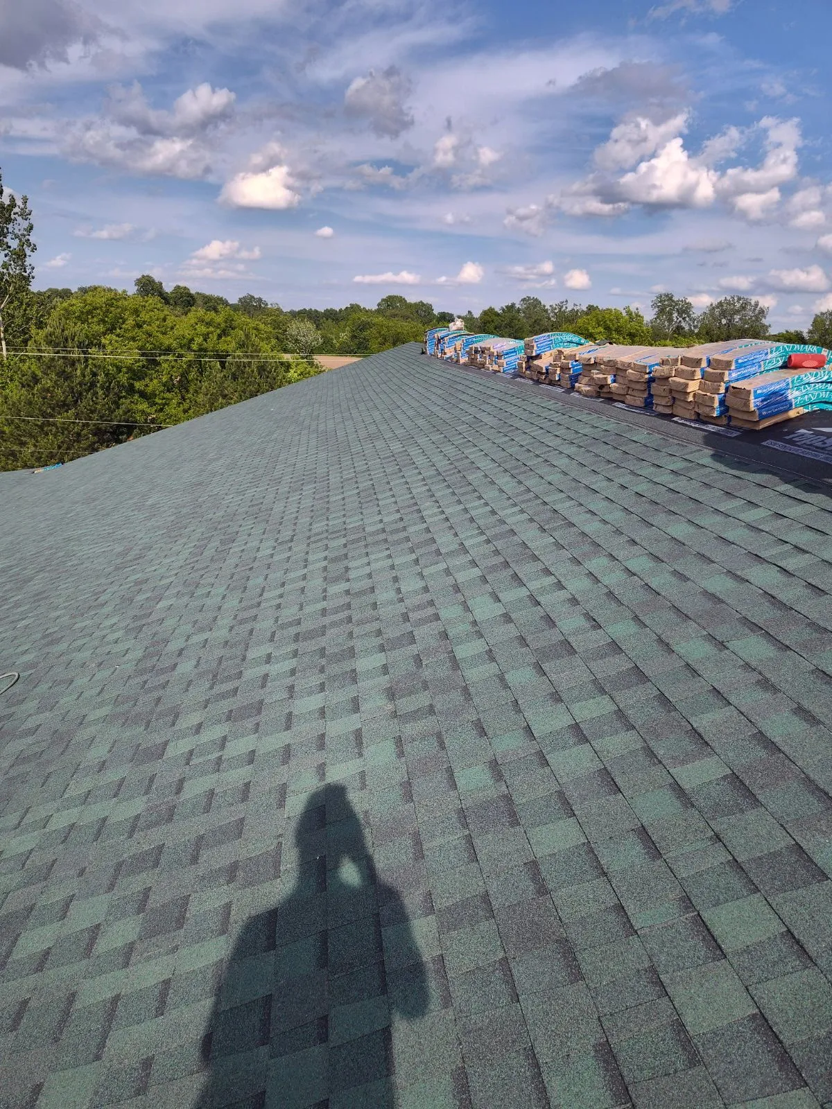 Completed residential shingle roof by DG Builders LLC serving Macomb County Michigan